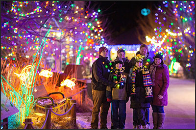 Group of guests at Electric Safar evening holiday light eventi at Cheyenne Mountain Zoo