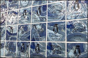 Water's Edge: African tile program wall, example of tiles available to purchase with custom engraving